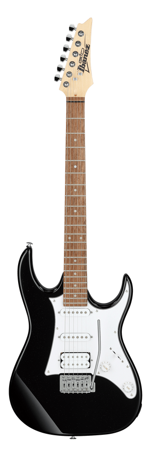Electric guitar with a black pickguard on a white background